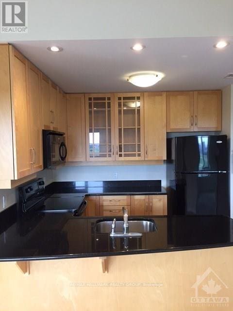 Photo - 314 Central Park Dr Unité 1010