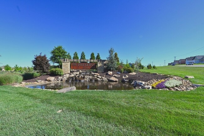 Photo - **BE THE LUCKY ONE TO LIVE IN THIS 2024-BUILT END-UNIT TOWNHOME IN A RESORT-STYLE COMMUNITY**