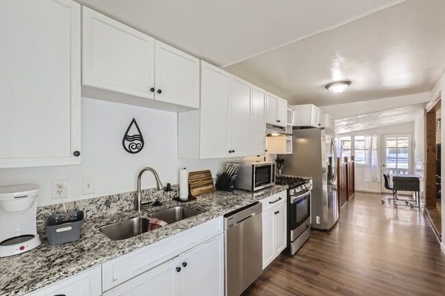 Building Photo - 5201 Lowell Blvd Unit A
