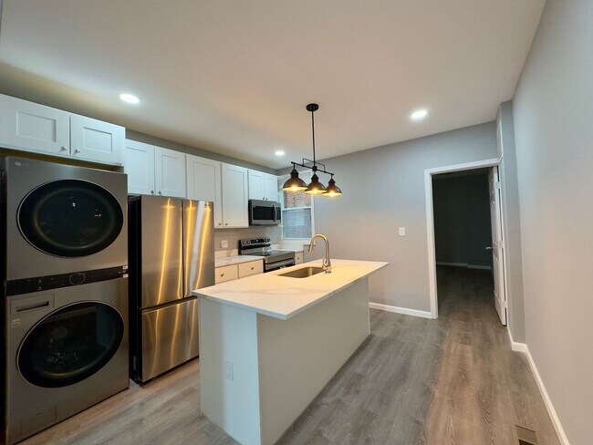 Photo - Spacious 4-Bedroom Townhome with Modern Amenities in Baltimore!