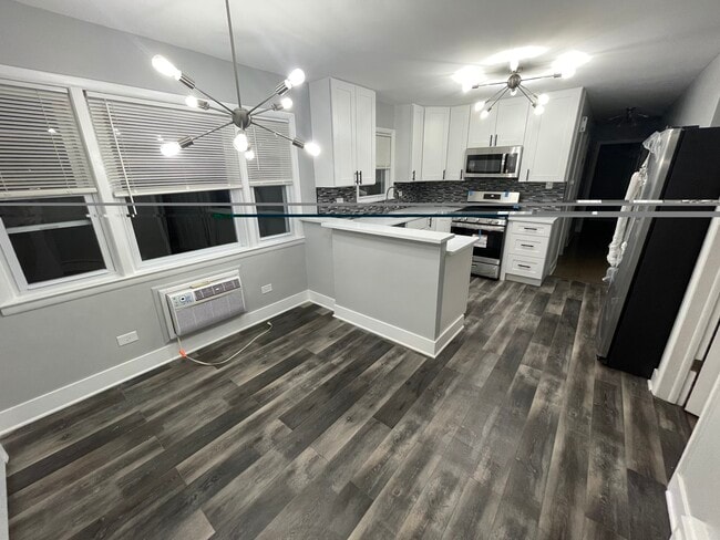 Photo - 6825 W Leland Ave Unidad 3