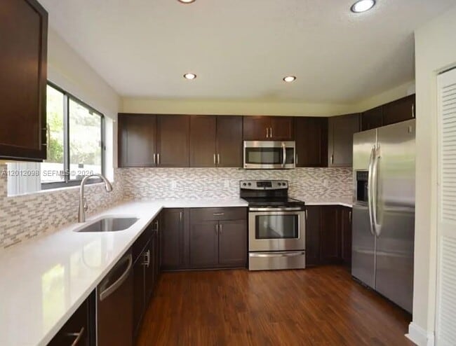 Building Photo - 587 NW 38th Ave