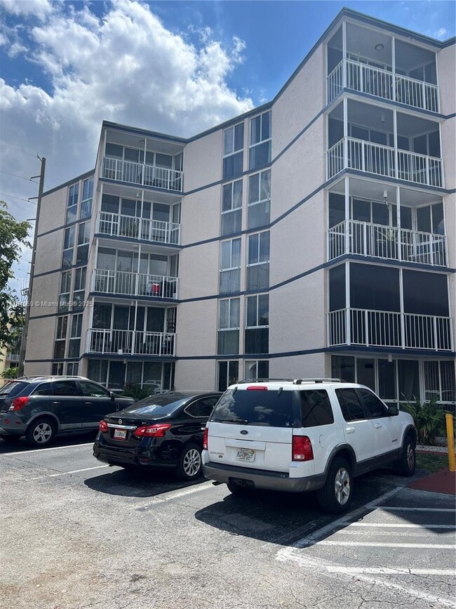 Building Photo - 7165 NW 186th St Unit A308 Rental
