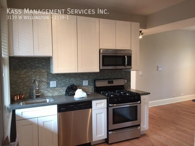 Building Photo - 3139 W Wellington Ave Unit 3139-1