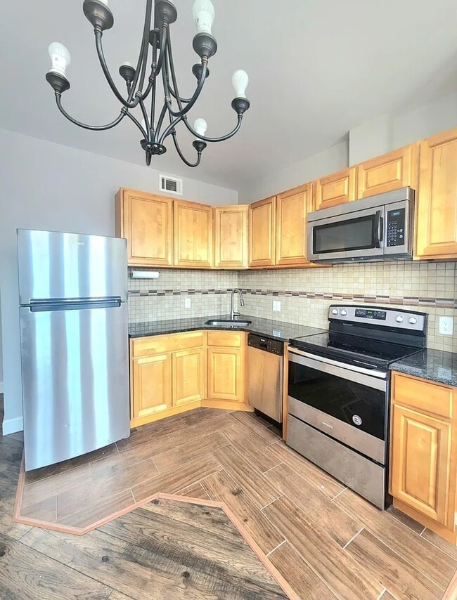 Building Photo - 5147 Catharine St Unit 2