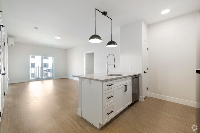2BR, 2BA - 1,053SF - Kitchen and LIving Room - The Village