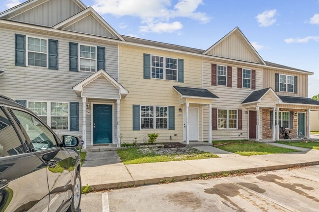 Photo - Charming 2-Bedroom 2.5-Bathroom Townhouse with Fenced Yard