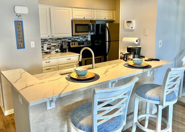 Building Photo - 12500 Melville Dr Unit 233D