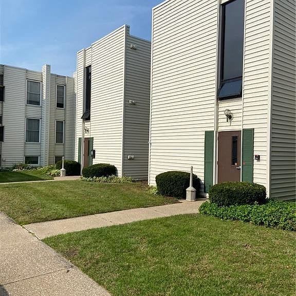 View of exterior of building - 1675 Cedarwood Dr Unit L Rental