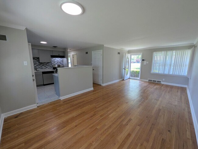 Photo - Updated Open-Concept with Sunroom & Finished Basement Space