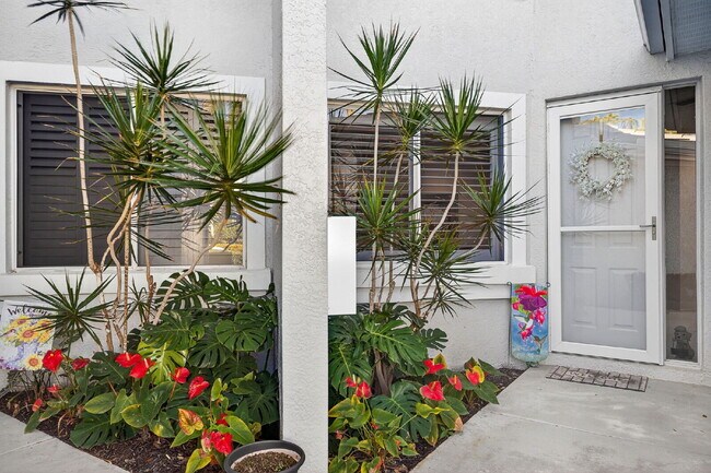 Photo - This 2 bedroom plus den, 2 bath condo with a one car garage offers expansive golf course and lake... Unit 4