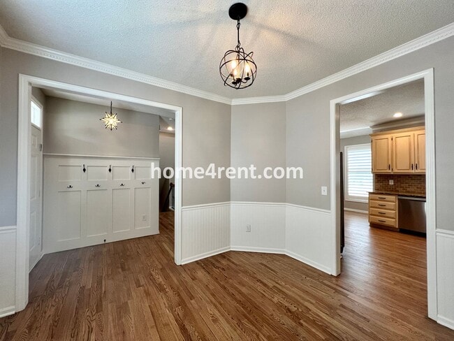 Photo - Updated Kitchen, Large Two Tiered Deck, Finished Basement in Blue Valley Schools!