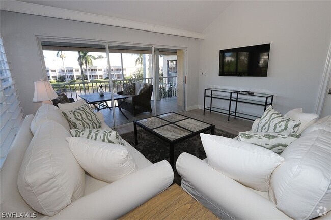Building Photo - 6131 Pelican Bay Blvd Unit 4 Rental