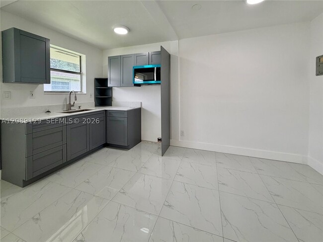 Building Photo - 3110 NW 135th St Unit 2