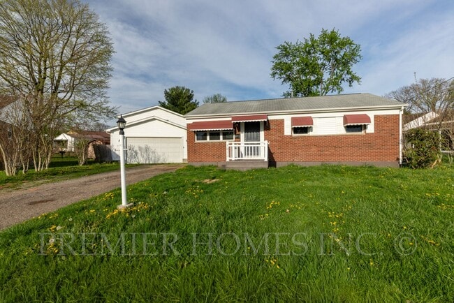 Building Photo - 3812 Root Ave NE Unit Front