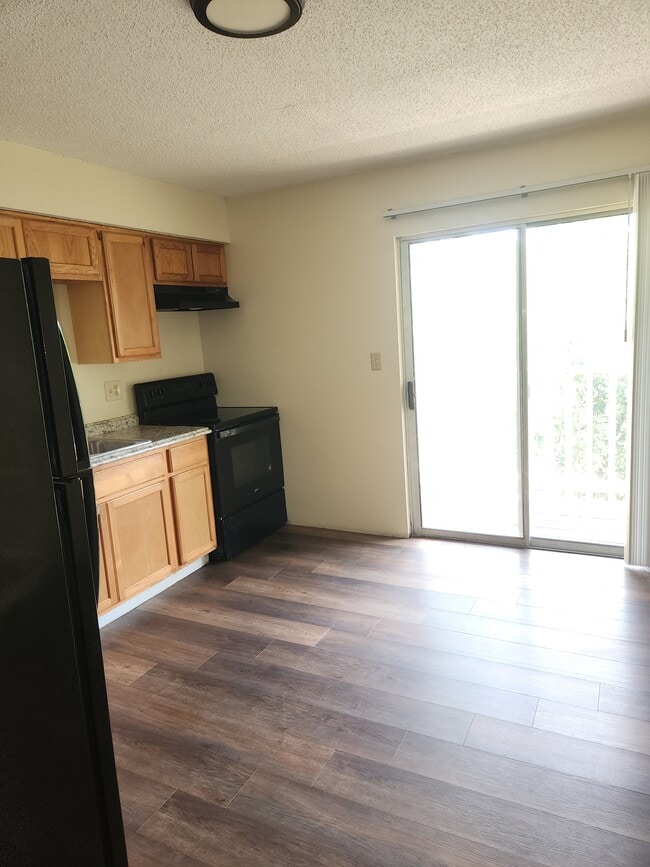 Eat In Kitchen - 696 S 72nd Ave Apartments Unit CUpstairs