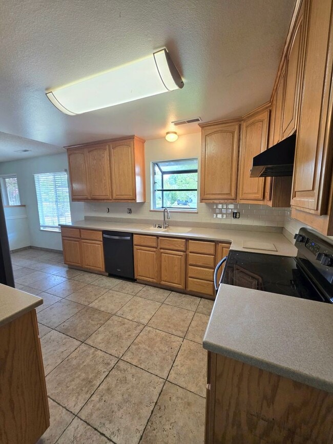 Photo - ***MOVE IN SPECIAL - $500 OFF FIRST MONTHS RENT***4BR/3BA with PRIVATE IN-LAW SUITE / SECOND LIVI...