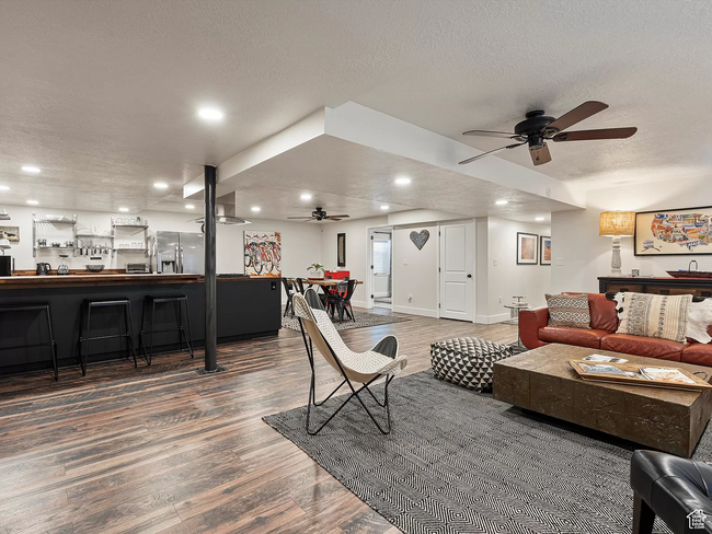 living room, looking towards dining and bedroom 1 - 1062 25th St Apartment