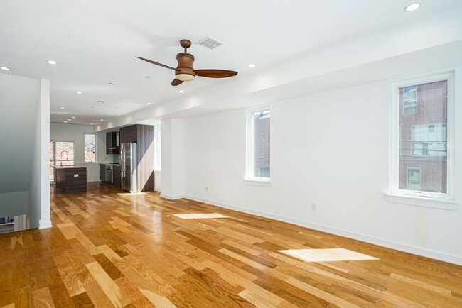Photo - Stunning 4-Bedroom Townhouse with Garage and Rooftop Deck! Available late May!