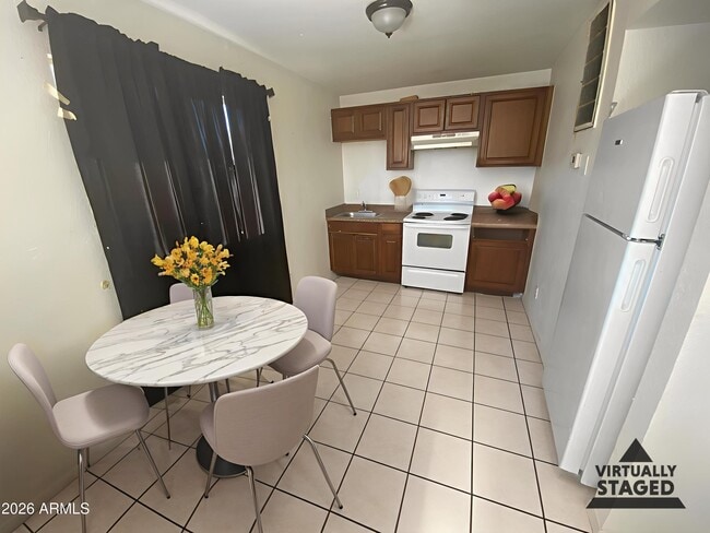 Building Photo - 1321 W Vogel Ave Unit 7