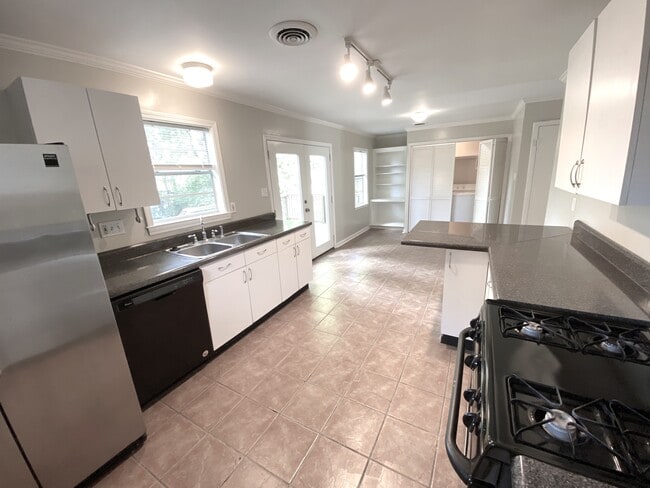 Kitchen and dining room - 132 N Rembert St House