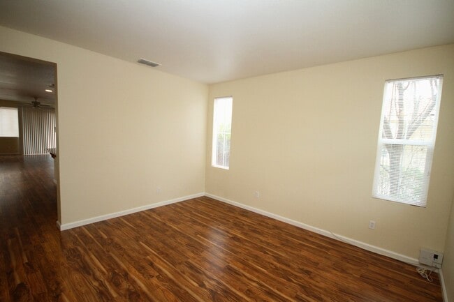 Photo - 4 Bed| 2.5 Bath | 2061 SF | 2 Car Garage | Long driveway with gate | Tenant pays $175 monthly for...