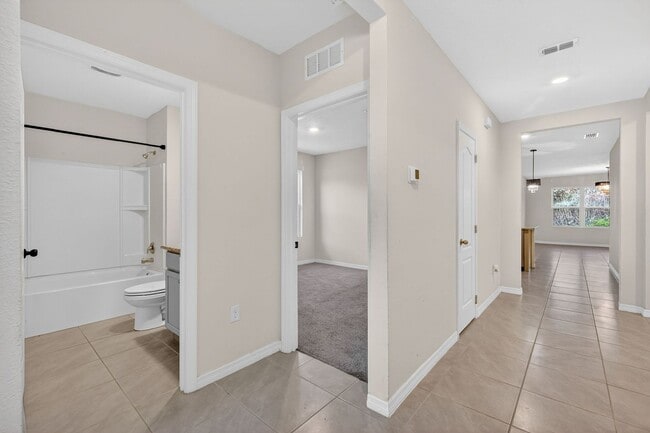 Photo - Available Now in Tavares | 2023 Built 4BR/2BA Home with 2-Car Garage