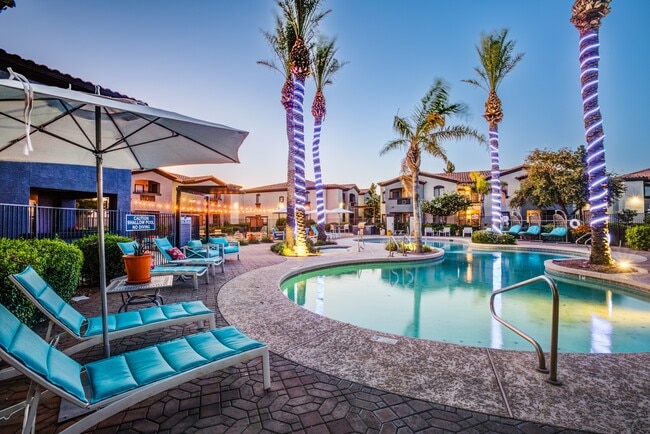Resort Style Pool & Sun Deck at Dusk - Estrella Gateway