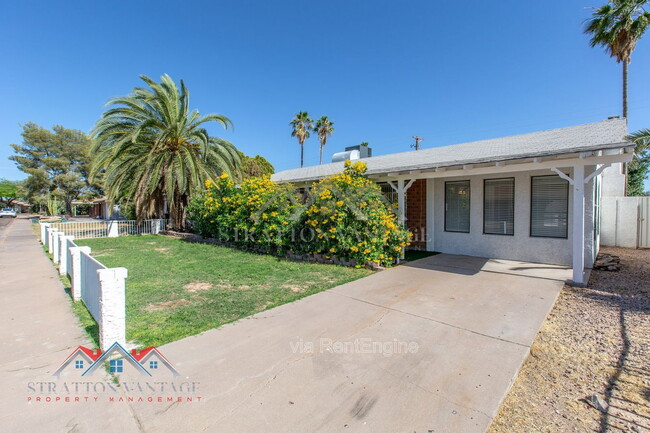 Building Photo - 8119 E Amelia Ave