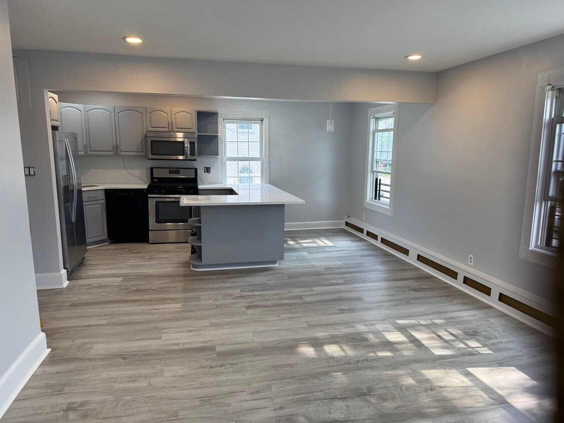 Kitchen with eat in island - 5829 254th St (Little Neck, NY)