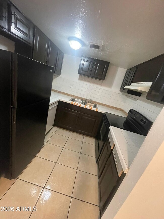 Building Photo - 2666 N 43rd Ave Unit D