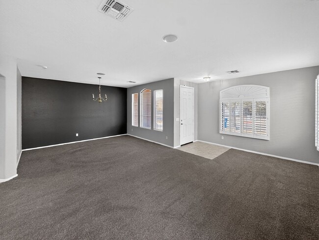 Photo - Single-level 4 bed, 2 bath home with tandem 3-car garage and RV gate.