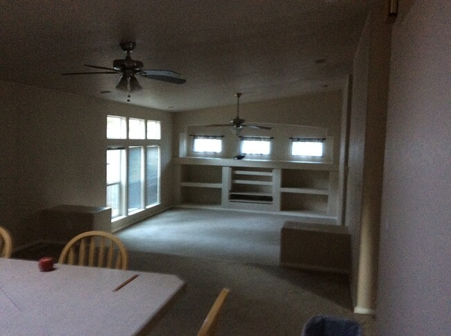 living room off kitchen - 4363 E Wintergreen Rd House