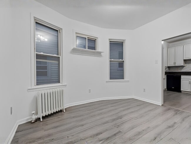 Living Room connected to Kitchen - 22 Harrison Ave Unit 2