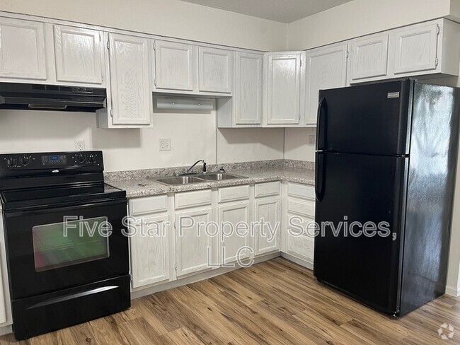 Building Photo - 404 E Madison St Unit Apt E