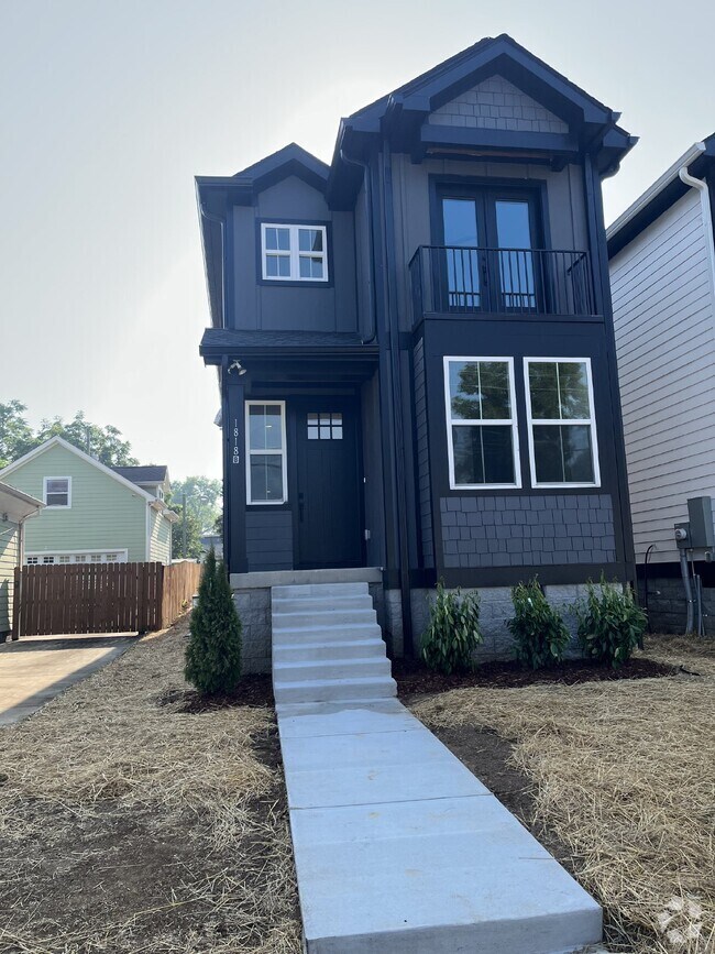 Building Photo - "Charming 4-Bed Nashville Oasis with Guest... Rental