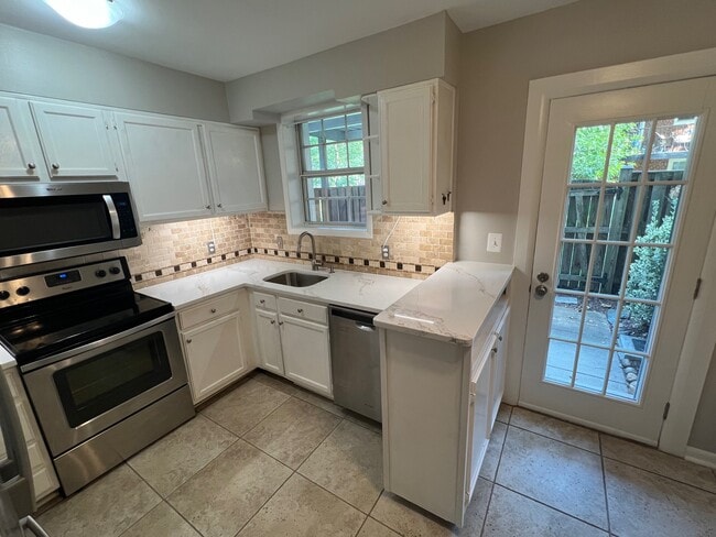 Updated bright kitchen and new appliances - 2507 S Walter Reed Dr Unit A