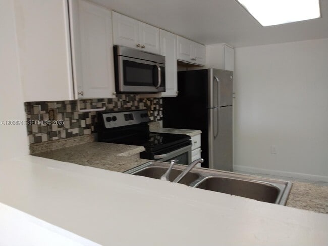 Building Photo - 805 SW 113th Way Unit 805