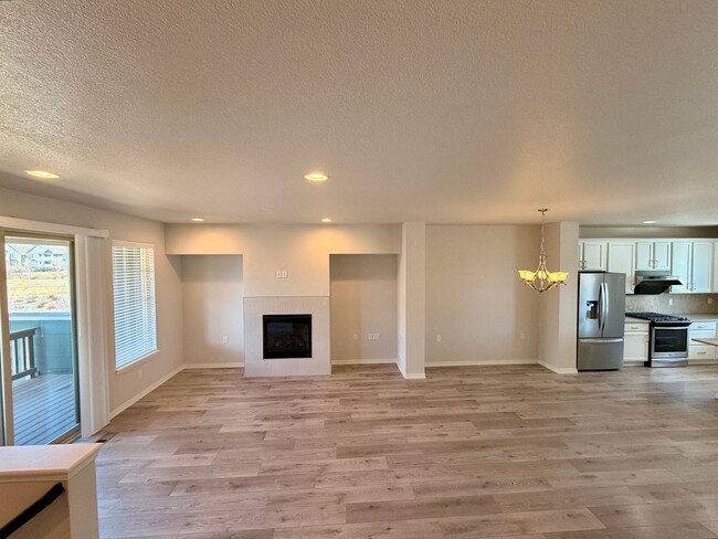 Photo - Move-In Ready 3-Story Townhome with Loft & 2-Car Garage