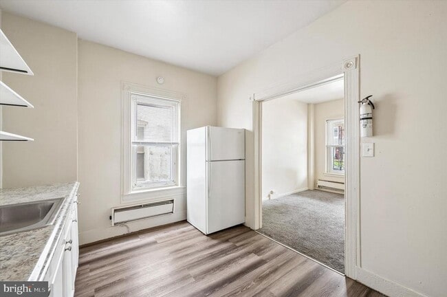 Building Photo - 13 E 21st St Unit A