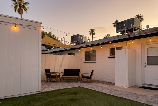 Private fenced back yard with string lights - 4615 N 14th St Unit A