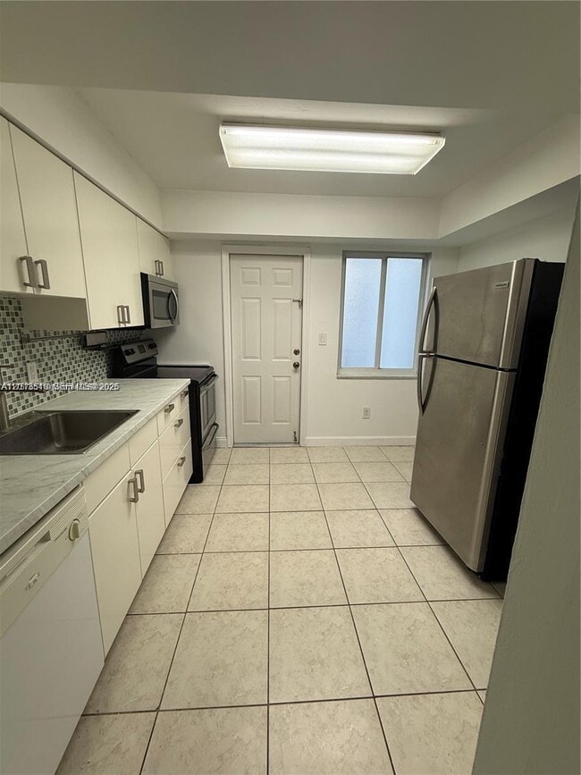 Photo - 9971 W Bay Harbor Dr Unit 205