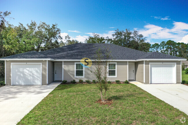 Building Photo - **Welcome to Your New Home in Palm Coast!** Unit A