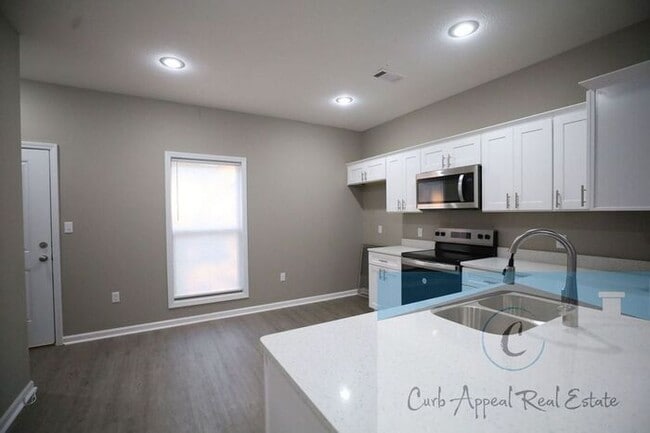 Photo - First month move in special $950!! Luxury 2 bed 2 bath apartment - brand new construction!! Washe...