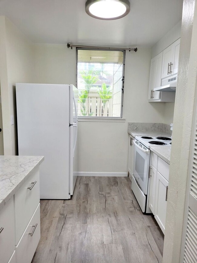 Photo - Available July 1, 2026 | A 3 Bedroom, 2.5 bath Townhouse with 2 parking stalls in Hokuala Hale
