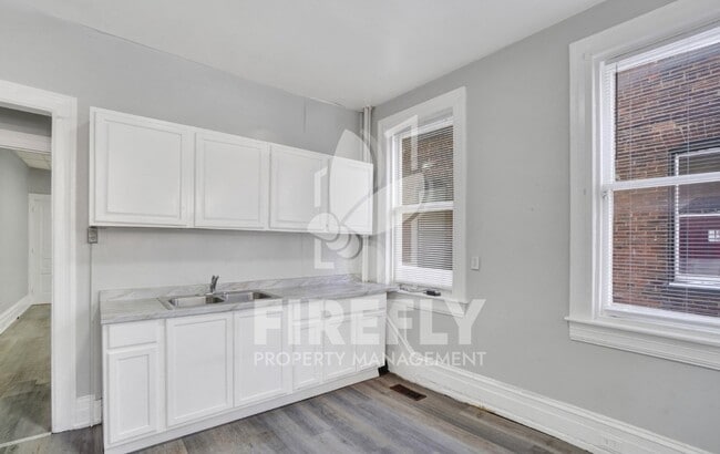 Photo - Welcome to your new home—a cozy and stylish spot in a friendly multi-family building right here i... Unit Apt 1
