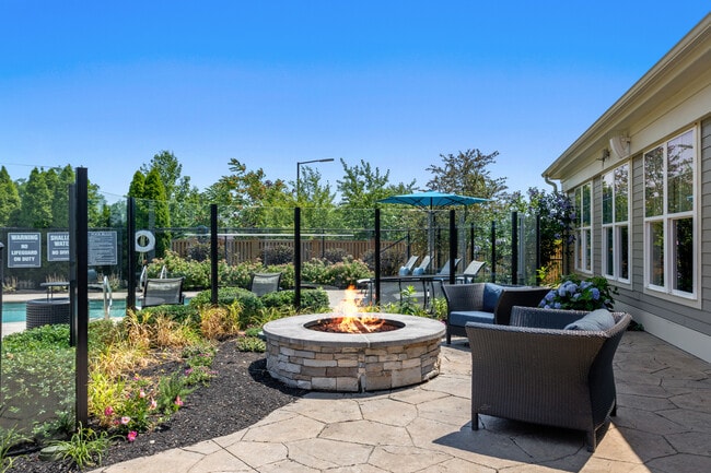Gather around the outdoor firepit for cozy evenings and conversation