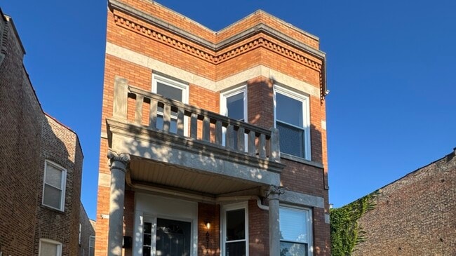 Building Photo - 6517 S Peoria St Unit 2 Rental