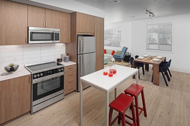 Luxury vinyl plank flooring is featured throughout all entry, kitchen, living/dining and baths