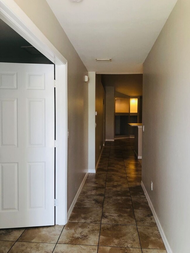 Photo - Experience this Cape Coral 3 bedroom 2 bath duplex with 1 car garage and screened in lanai.